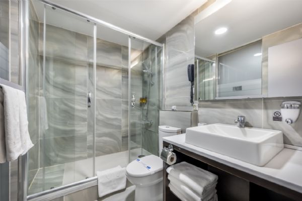 Bathroom With Hairdryer And Scale